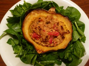 Apple cider tempeh vegan stuffed squash for fall with spinach